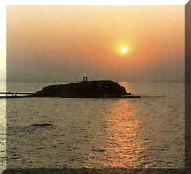 The sunset as you see it from Grotta Hotel